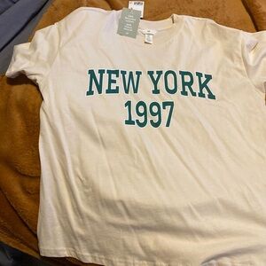 New York t shirt with green writing